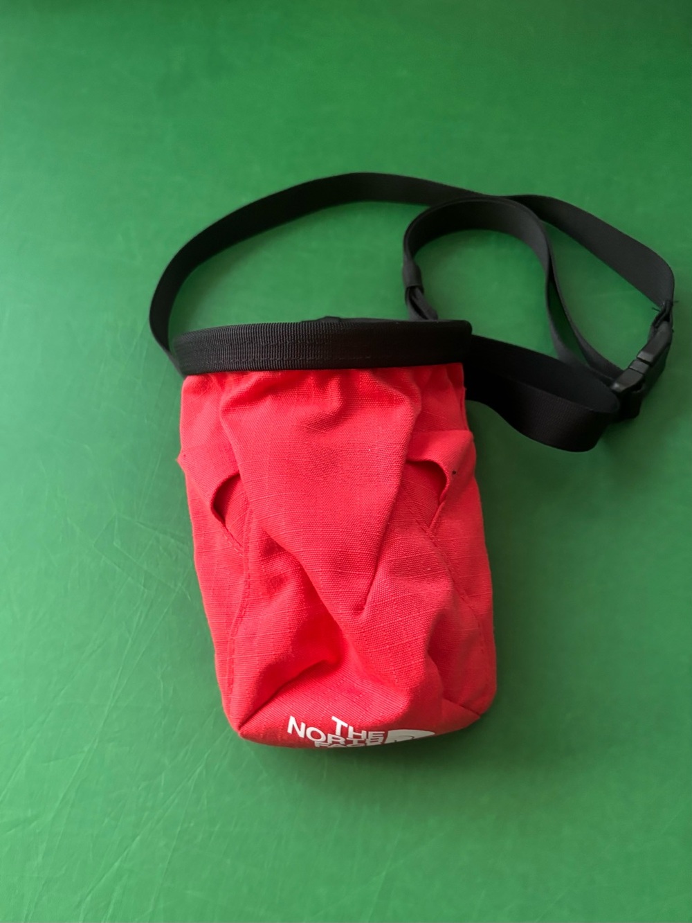 The North Face Red Chalk Bag with Black Belt